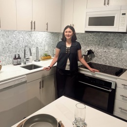 a person standing in a kitchen