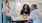 Friends standing around a kitchen island talking 